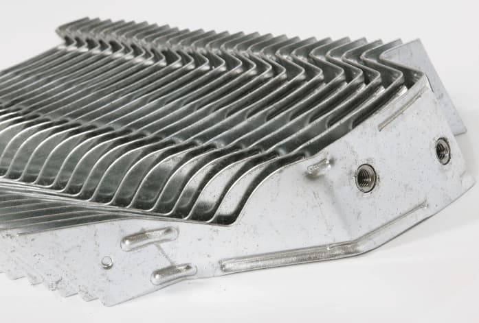 metal stamped parts nestled together